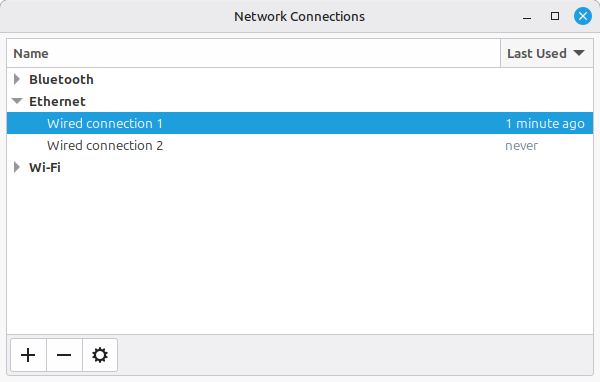 Network Connections window showing the Ethernet and Wi-Fi connections and network devices. The Wired connection 1 is selected.